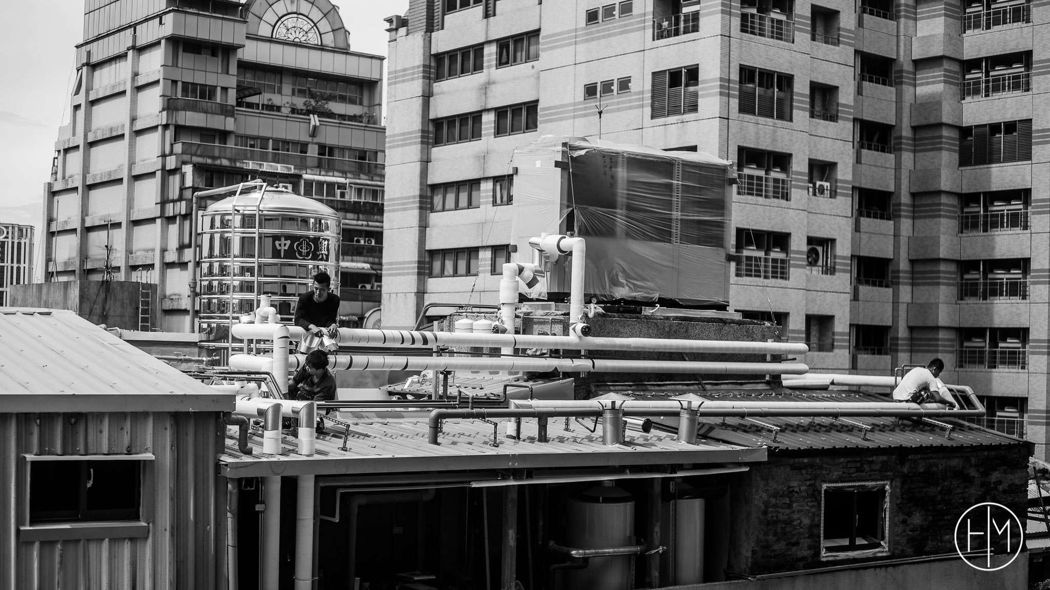 Ouvriers sur un building Taipeih